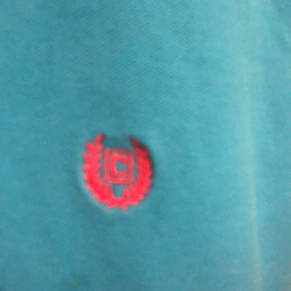 Classic fit world polo shirt in size Xl turquoise color the emblem is pink - Picture 2 of 7
